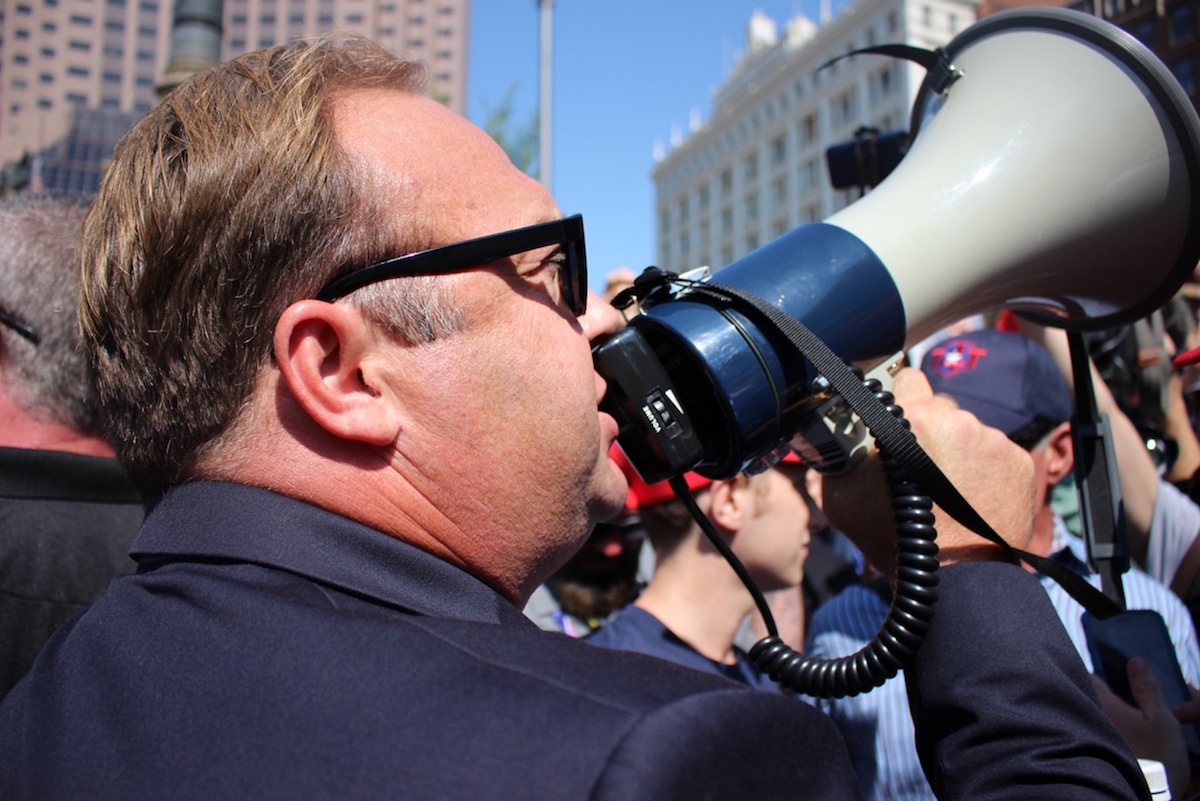 kto to alex jones youtube spotify itunes