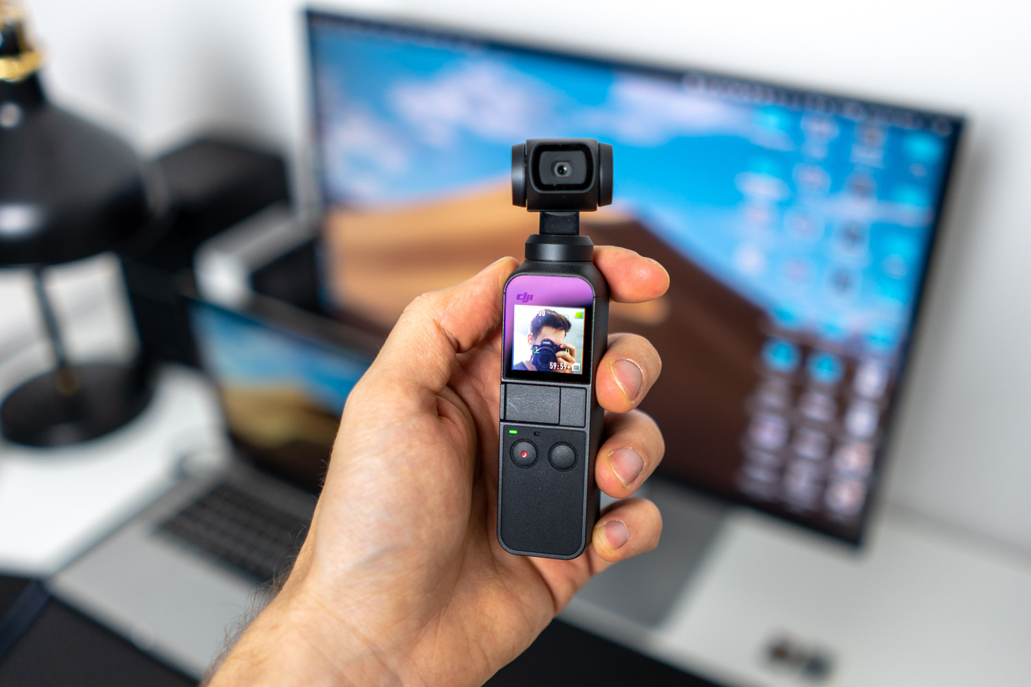 DJI Osmo Pocket, or 4K camera with gimbal, which you can put in your