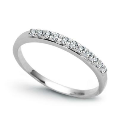 Staviori pierścionek. 11 diamentów, szlif brylantowy, masa 0,15 ct., barwa h, czystość si2. białe złoto 0,585. szerokość 4 mm.