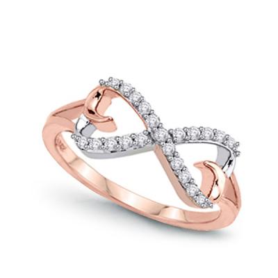 Staviori pierścionek. 21 diamentów, szlif brylantowy, masa 0,18 ct., barwa h, czystość si2. białe, różowe złoto 0,585. średnica korony ok. 7,2x16 mm. wysokość 3,7 mm.