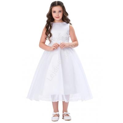 Dziecięca biała sukienka na komunię zdobiona koronką