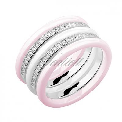 Dwa różowe pierścionki ceramiczne, biały pierścionek ceramiczny i pierścionek srebrny z cyrkoniami