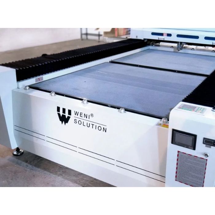 Laser Co2 Weni 1830TC 130W stół taśmowy podajnik autm. - od ręki