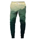 green sweatpants with forest motive