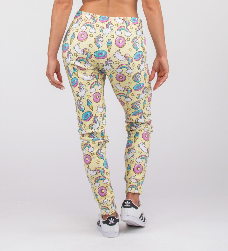 yellow sweatpants with unicorns motive
