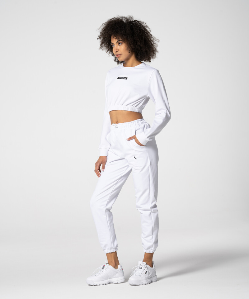 White sweatpants with elastic cuffs