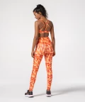 Pomarańczowe legginsy na siłownię