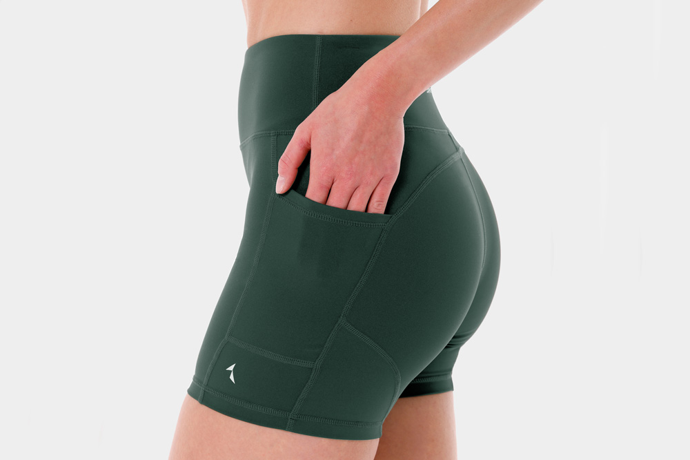 beige women's sports shorts with pockets